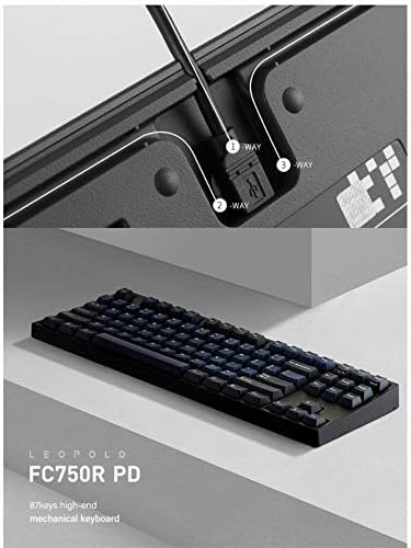 Underside of Leopold FC 750R PD keyboard showing USB cable routing channels and included accessories.