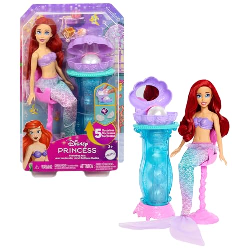 Mattel Disney Princesas Ariel com toucador dobrável boneca de moda de sereia com cauda removível e toucador com cinco surpresas repetíveis e cinco acessórios, JBF86