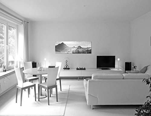 Leinwandfoto als Panorama SCHWARZ/WEISS 150x50cm Berge Wald Schnee Wolken Sonnenstrahlen