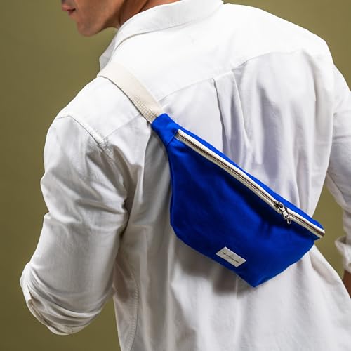Image of The Peacock Crew Fanny Pack - Stylish Cotton Crossbody Bag for Men & Women - Adjustable Strap, Dual Zipper - Premium Fabric Shoulder Bag, Trekker Indigo Blue