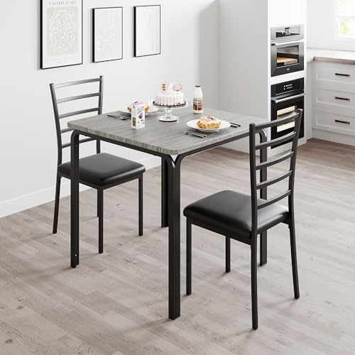 Conjunto compacto de comedor moderno con mesa rectangular y sillas de diseño versátil 2