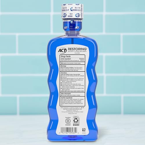 Image of ACT Restoring Fluoride Mouthwash 18 fl. oz. Strengthens Tooth Enamel, Cool Mint