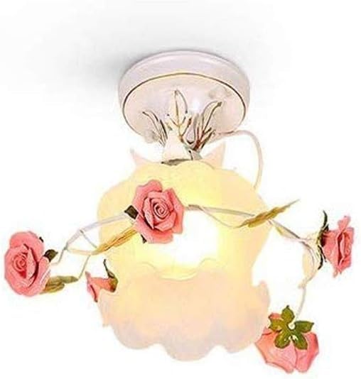 Plafonnier en céramique rose pour adoucir l'éclairage d'une chambre