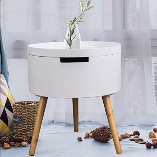 Espace de rangement caché et table d'appoint ronde pour petits salons