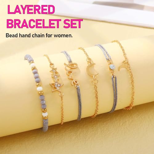 Juego de pulseras estrella y luna doradas 411+nw06mgL. SL1000