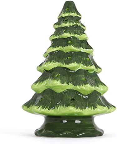 Foto Una Mesa Y Sillas Con Un árbol De Navidad Iluminado En El Fondo