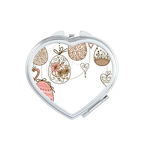Miroir compact Pâques rose pour corriger son maquillage partout avec un miroir de poche