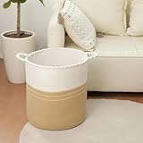 Fabriqué en corde de coton tressée hautement résistante, ce panier à lessive combine douceur au toucher et solidité. Son design bicolore blanc cassé & beige ajoute une touche chaleureuse et moderne à votre décoration intérieure.