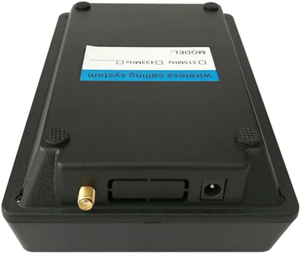 Rear view of the CYSSJF K-999 Keypad showing the antenna connector, power input, and a label indicating 'Wireless calling system' and frequencies 315MHz/433MHz.