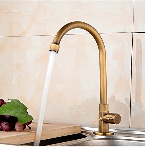 Grifo de cobre para fregadero de cocina que soluciona la falta de espacio con su caño alto giratorio