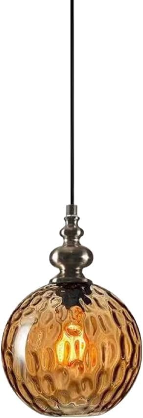 Luminaire suspendue en verre vintage pour illuminer un îlot de cuisine