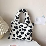 Diese perfekte Tasche ist sowohl modisch als auch funktional und ermöglicht es Ihnen, all Ihre täglichen Dinge an einem praktischen und stilvollen Ort aufzubewahren.