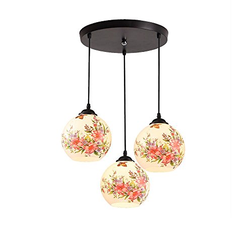 Lustre en verre rond haut pour illuminer une salle à manger moderne