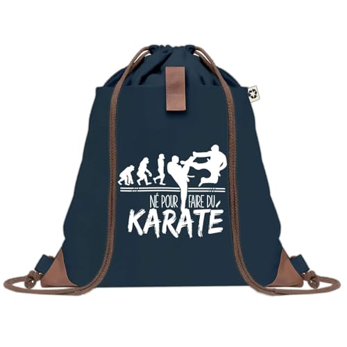 Sac à dos bleu karaté robuste pour éviter les affaires encombrantes