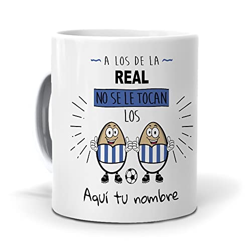 mundohuevo. Taza original para los aficionados de la Real Sociedad con frase “A los del Real Sociedad no se le tocan los huevos”.| Taza de cerámica AAA.| Capacidad de 350ml.| Haz un regalo único.