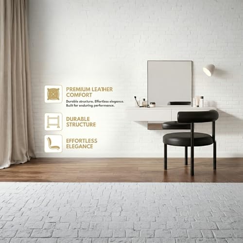 كرسي طعام عصري من الجلد الصناعي الاسود من دوليو بتصميم ظهر منحني مع ارجل معدنية سوداء، مقعد فانيتي