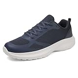 Elementos de diseño: colores neutros como negro, blanco y gris, estilo deportivo limpio, en línea con la estética masculina
