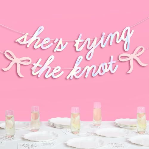 Image of xo, Fetti She's Tying the Knot Banner - Iridescent Foil | 4.5 Ft. | Bow Bachelorette Decorations, Engagement Party Sign, Proposal Background, Bach Supplies