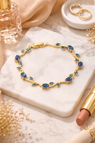 Image of VIEN 18k Gold Plated Vine Leaf Bracelet for Women, Blue Sapphire Crystal Marquise Cut Link Bracelet, Adjustable Nature-Inspired Floral Jewelry for Weddings, Anniversaries, and Special Occasions