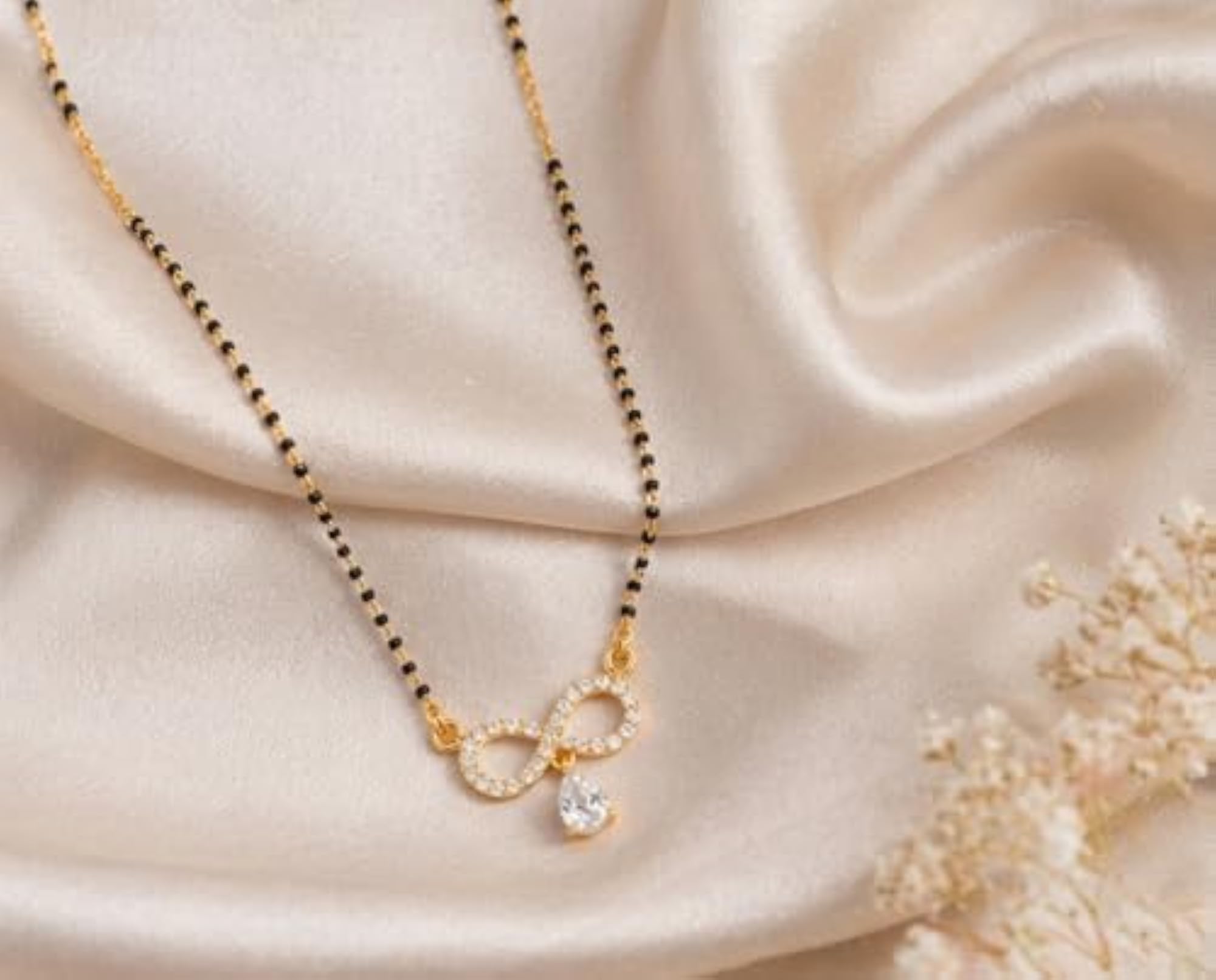 Gold Plated Infinity Pendant Short Mangalsutra with American Diamonds