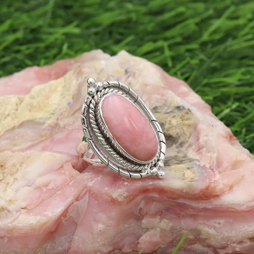 Bague opale rose : sublimez vos mains avec style