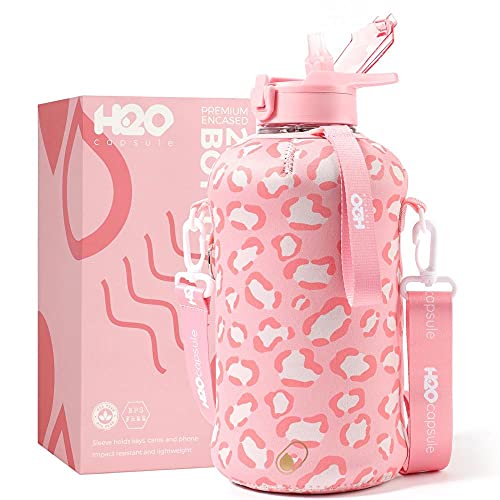 H2O Capsule 2.2L Half Gallon Water Bottle with Storage Sleeve and Covered Straw Lid â€“ BPA Free Large Reusable Drink Container with Handle - Big Sports Jug, 2.2 Liter (74 Ounce) Pink Leopard