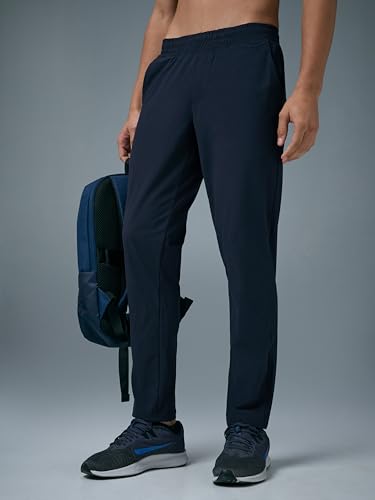Image of TECHNOSPORT Men's Regular Fit Mid Rise Solid Plus Size Trackpants with Quick Dry, Anti Microbial, SPF50+ for Regular and Sports Use