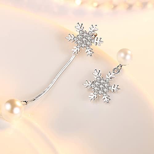 Boucles d'oreilles asymétriques pour sublimer un style trop terne - 3