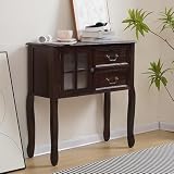 Decorativo e pratico: questo armadietto multifunzione non solo offre ampio spazio ma funge anche da elegante elemento decorativo. Mostra piante verdi, cornici per foto o ornamenti artistici sulla sua superficie per migliorare l'atmosfera del tuo spazio. Il suo design versatile integra gli stili di casa moderni, rustici o vintage, integrandosi perfettamente per elevare l'arredamento degli interni.