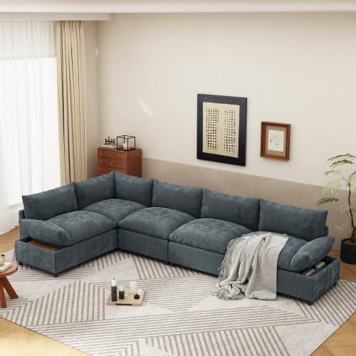 Close-up of hidden storage compartments under the seat cushions of a gray modular sectional sofa