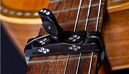 Cejilla de madera flamenca artesana de Palosanto para guitarras española  flamenca. Capo capotraste hecho a mano en Granada. Accesorio flamenco  musical original. - MundoGuitarra.es