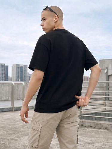 Image of LEOTUDE Men's Street Style Graphic T-Shirt | Athletic Typography Print | Oversized | Round Neck | Graphic Print | Baggy Fit | Drop Shoulder | Casual Tee (Color : Black)
