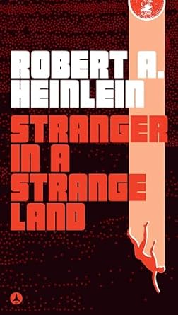 Stranger In A Strange Land, a sci-fi novel by Robert A. Heinlein, dark book cover featuring a man's silhouette falling in a spotlight.