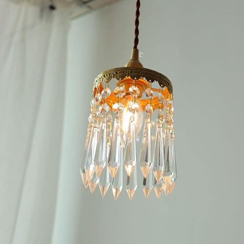 Lámpara de cristal dorada regulable para iluminar tu mesa de comedor 4