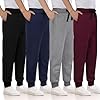 Paquete de 4 pantalones deportivos para niños con forro polar con cordón de ajuste de bolsillos, pantalones deportivos para niños y jóvenes