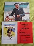 12 photos couleurs (21 cm x 27 cm) + dépliant 4 p (16 cm x 24 cm) de Le facteur de Saint-Tropez (1985), film de Richard Balducci avec Paul Préboist - Bon état.