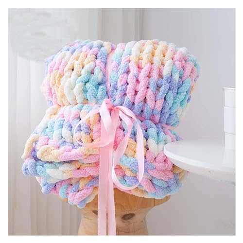 Couverture en tricot torsadé multicolore pour un canapé-lit cocooning