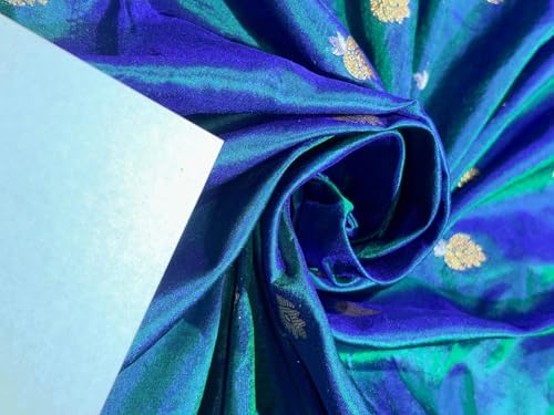 Tissu brocart soie rigide bleu et vert pour créer des vêtements structurés