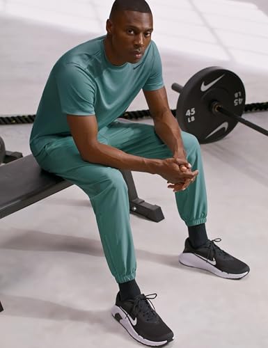 Image of Nike Men's Form Dri-FIT Tapered Versatile Pants