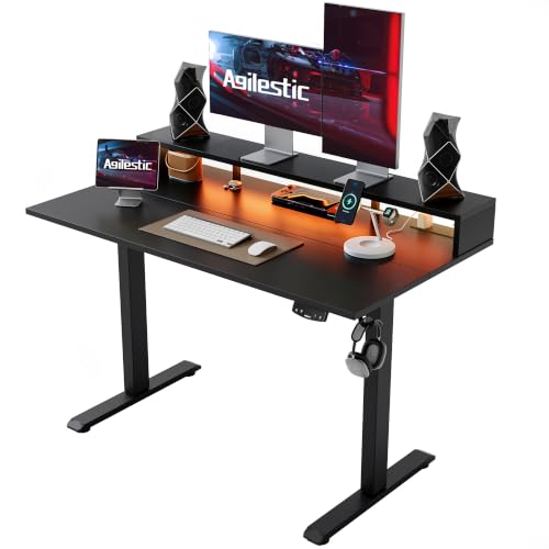 Image of Agilestic 55 x 24 Inch Electric Standing Desk with Shelf, Height Adjustable Desk with Power Outlets & LED, Sit Stand Up Table with Monitor Stand, Computer Workstation, Black