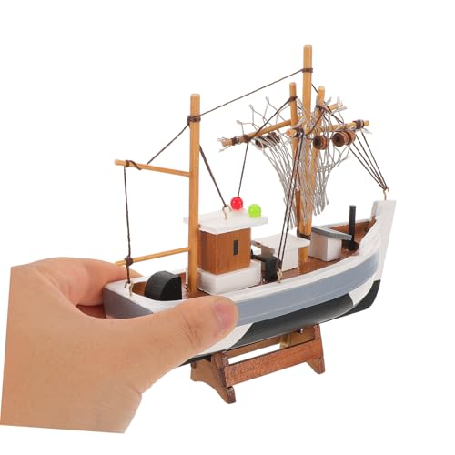 Barco de vela de madera para decorar un salón costero con un ambiente versátil y luminoso 5