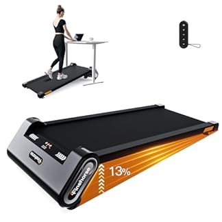 A stylish individual walking on the FINEHORSE Up Pad treadmill with auto incline, featuring a sleek black design and 13% incline capability, paired with an adjustable standing desk and a remote control, ideal for multitasking at home or office.