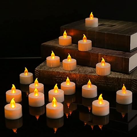 Teynewer 12 Pack Flameless Tea Lights Candles Flickering Realistic Battery Operated LED Candles Tealights Fake Candle in Warm Yellow for Halloween Christmas Weddings Birthday Festivals Decoration Cover