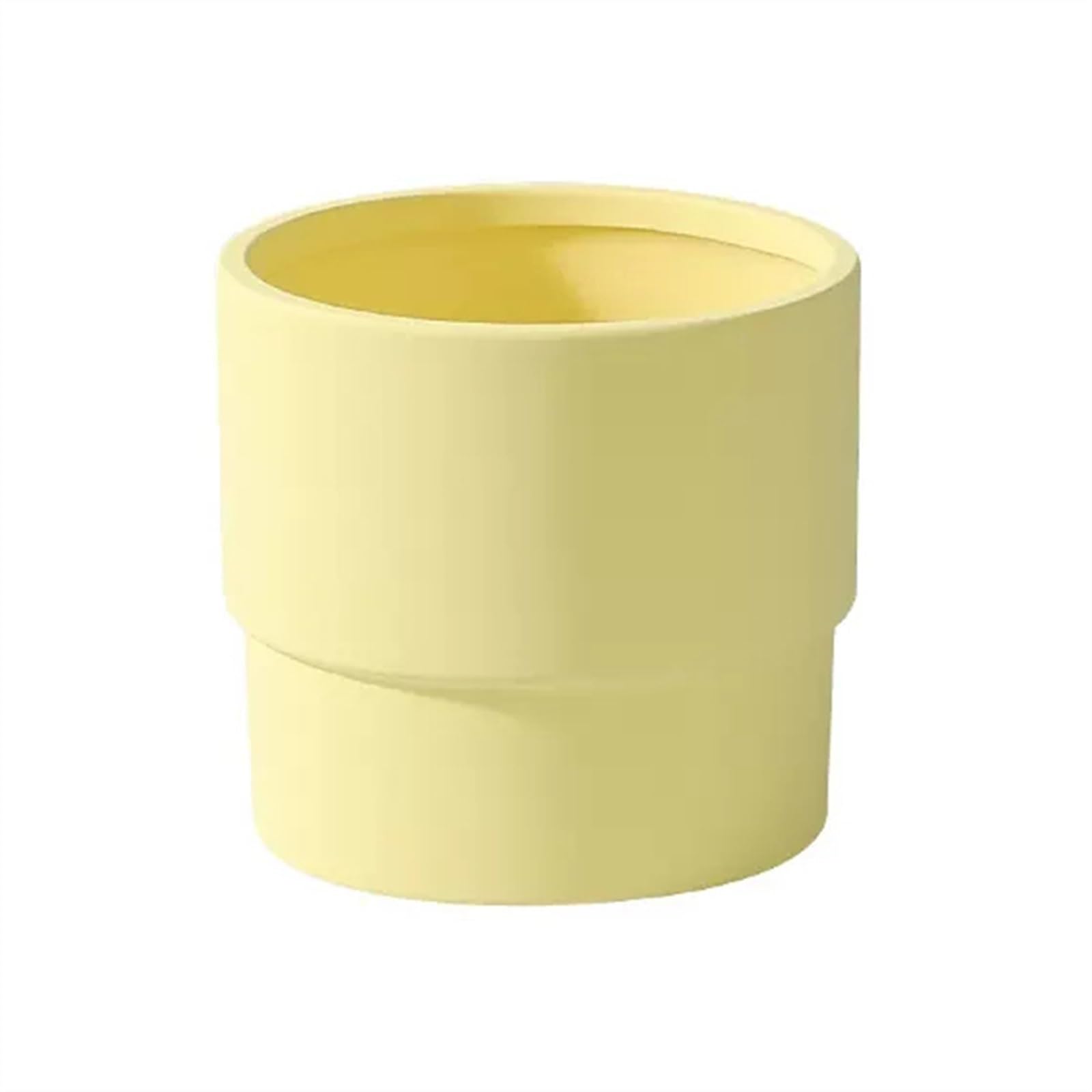 Pots de fleurs en céramique jaune pour décorer un salon lumineux