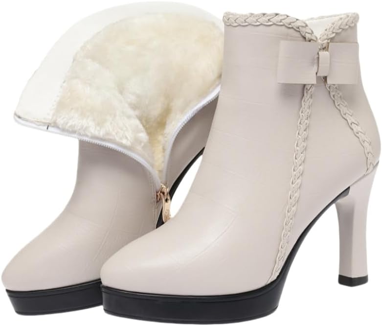 Lady's pointed-toe, thick-soled, bow-shaped ankle boots, made of fashionable leather material. There is a zipper design on the side and the interior is lined with fur for warmth and comfort.