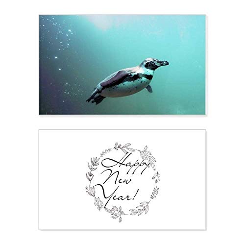Tarjeta conmemorativa de Año Nuevo sobre el pingüino antártico