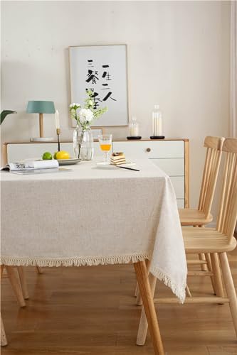 Nappe rectangulaire lavable anti-tache beige en polyester solide avec pompons pour table basse