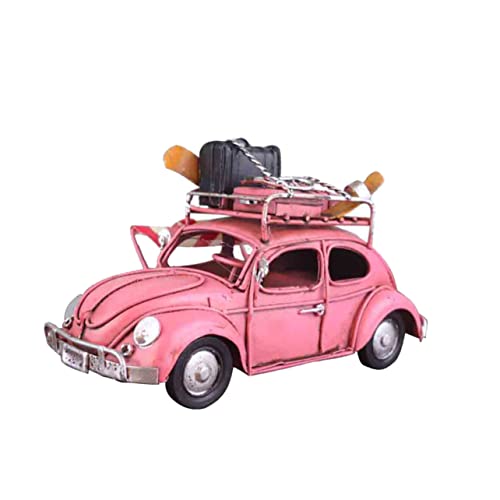 Modèle de voiture ancienne en fer rose pour une décoration de bureau vintage et élégante