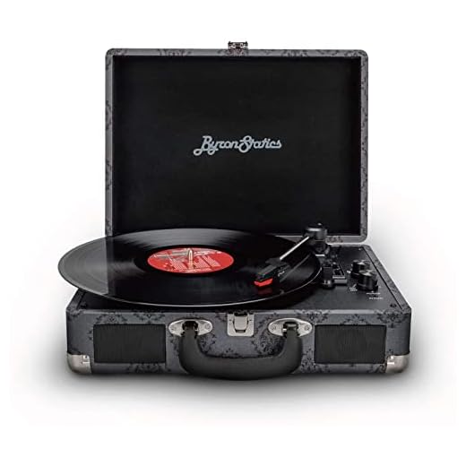 Byron Statics Vinyl skivspelare, hastigheter på 33/45/78 varv/min Bluetooth-skivspelare, intern högtalare, ersättningnål, RCA-linjeut, AUX-ingång, vintage resväska (mörkgrå)