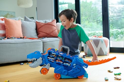 Image of Bundle of Hot Wheels City Track Set, Ultimate T-Rex Transporter, Hauler Transforms into Stomping Dino with Race Track + Hot Wheels Set of 10 Toy Trucks and Cars, Styles May Vary (Amazon Exclusive)